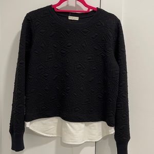 Sweatshirt with white shirt detail at the bottom